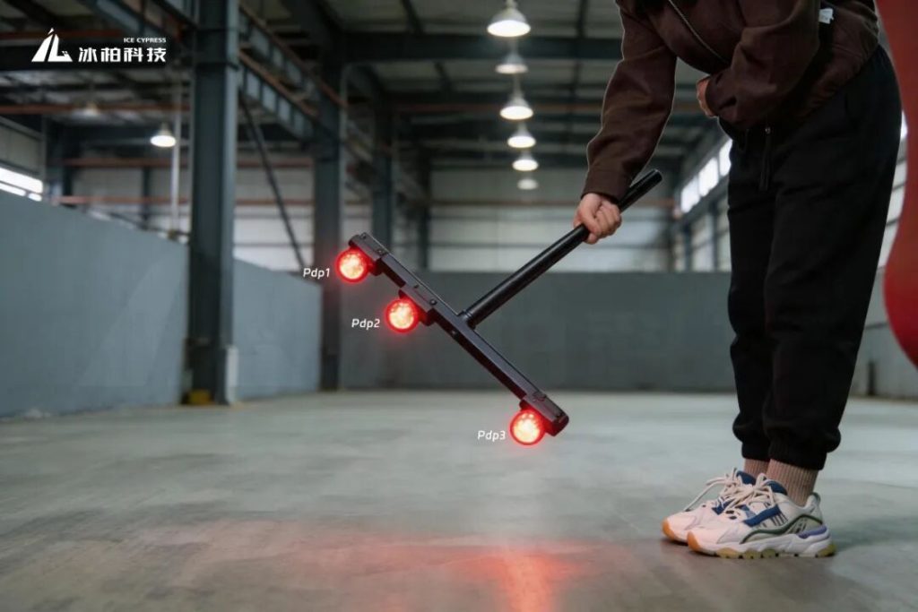 an operator simply holds the wand and waves it naturally within the cameras' combined field of view, covering approximately 80% of the capture volume.