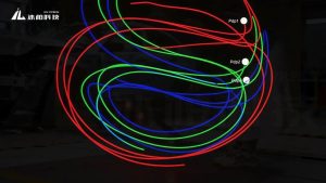 In practice, an operator simply holds the wand and waves it naturally within the cameras' combined field of view, covering approximately 80% of the capture volume.